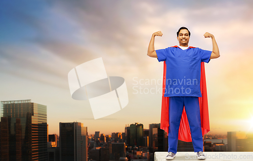 Image of smiling doctor or male nurse in superhero cape