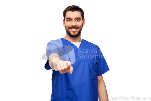 Image of doctor or male nurse pointing finger to camera