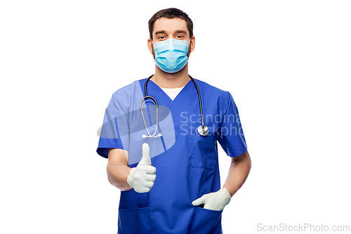 Image of male doctor in blue uniform, mask and gloves