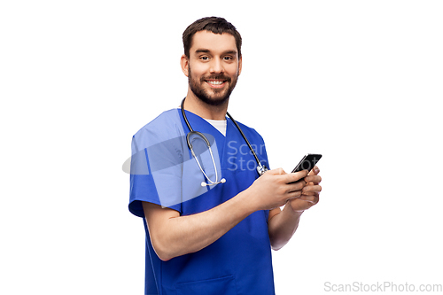 Image of smiling doctor or male nurse using smartphone