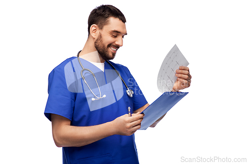 Image of smiling male doctor with cardogram on clipboard