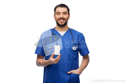 Image of doctor or male nurse with medicine and stethoscope