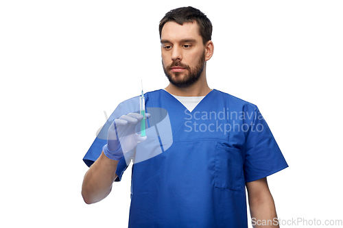 Image of doctor or male nurse with medicine in syringe