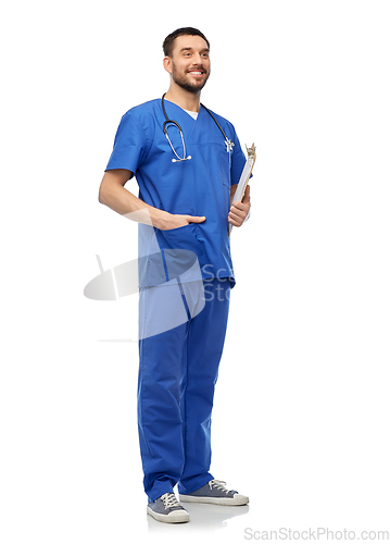 Image of smiling doctor in blue uniform with clipboard