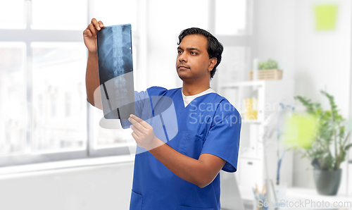 Image of indian doctor or male nurse with x-ray