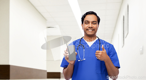 Image of doctor or male nurse with phone showing thumbs up