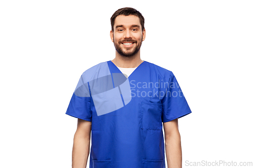 Image of happy smiling doctor or male nurse in blue uniform