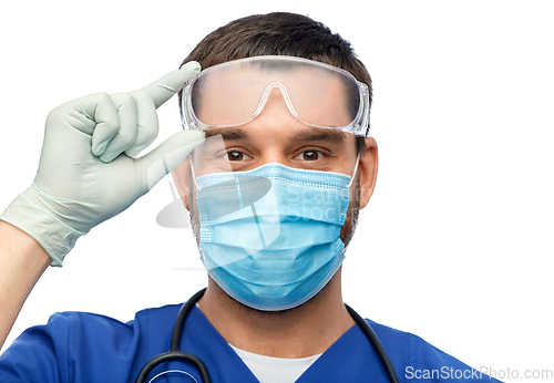 Image of male doctor in goggles, mask and gloves