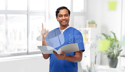 Image of indian male doctor with folder pointing finger up