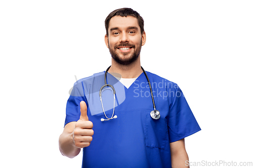 Image of smiling doctor or male nurse showing thumbs up