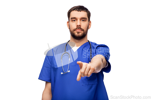 Image of doctor or male nurse pointing to camera