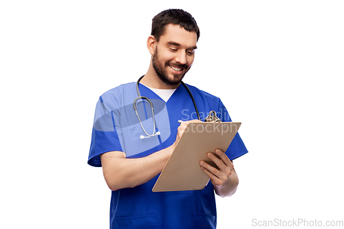 Image of male doctor writing medical report on clipboard