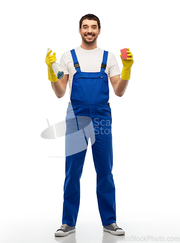Image of male cleaner cleaning with sponge and detergent