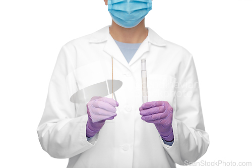 Image of female doctor with test tube and cotton swab