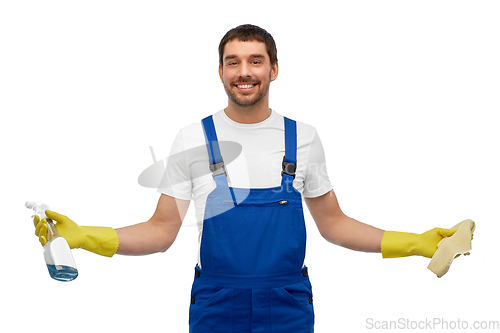 Image of male cleaner cleaning with rag and detergent