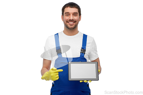 Image of happy male worker or cleaner showing tablet pc