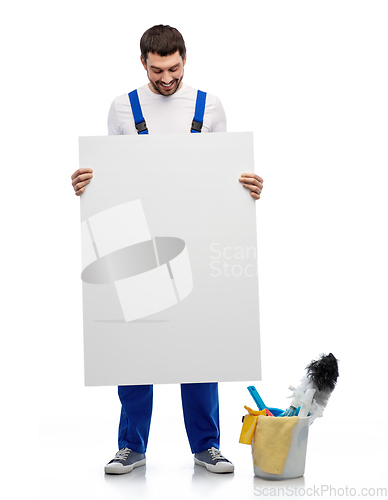 Image of male cleaner with cleaning stuff and white board