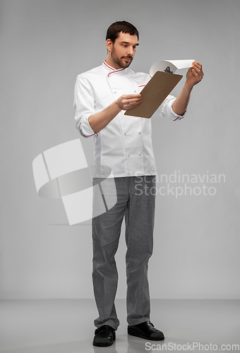 Image of male chef with clipboard