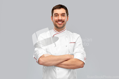 Image of happy smiling male chef with crossed arms