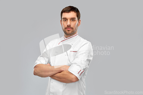 Image of happy smiling male chef with crossed arms