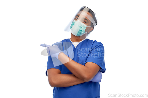 Image of indian male doctor in mask and face shield