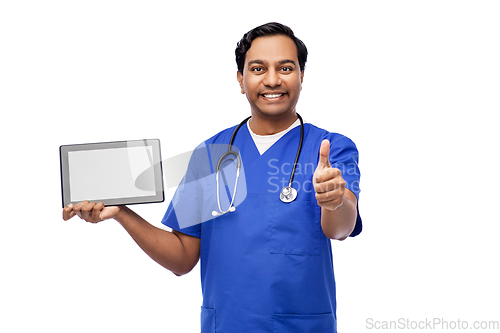 Image of male doctor with tablet pc showing thumbs up