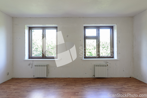 Image of View of two windows in a room with a fine finish