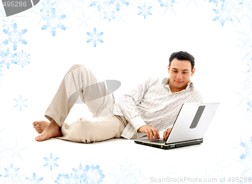 Image of relaxed man with laptop
