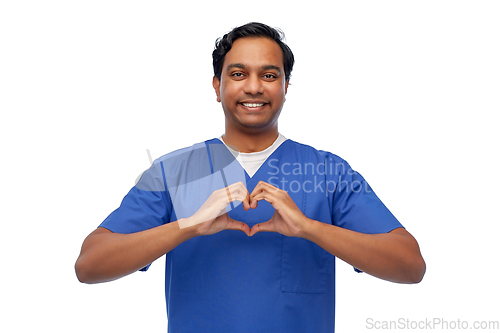 Image of smiling indian male doctor showing hand heart