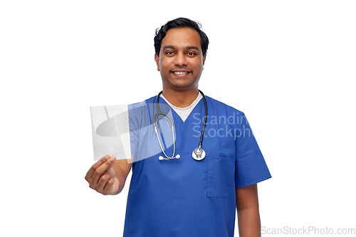 Image of indian doctor or male nurse with prescription