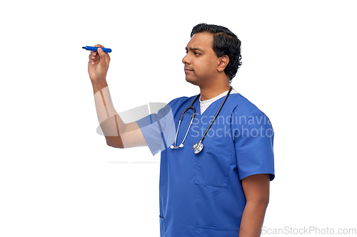 Image of indian male doctor writing something with marker