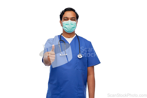 Image of indian male doctor in mask showing thumbs up