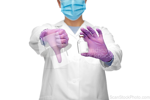 Image of close up of doctor with medicine shows thumbs down