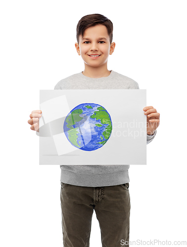 Image of smiling boy holding drawing of earth planet