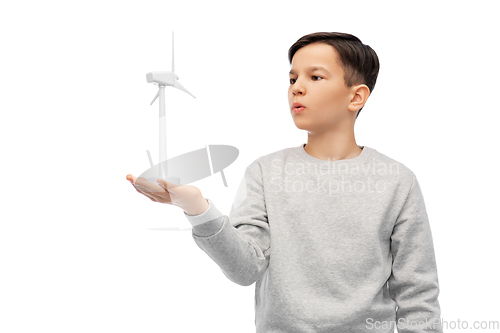 Image of boy with toy wind turbine