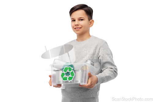 Image of smiling boy sorting metallic waste