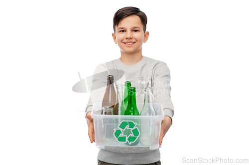 Image of smiling boy sorting glass waste