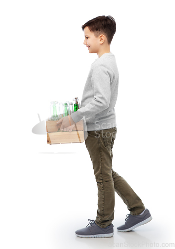 Image of smiling boy with wooden box sorting glass waste