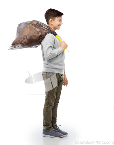 Image of smiling boy with paper garbage in plastic bag