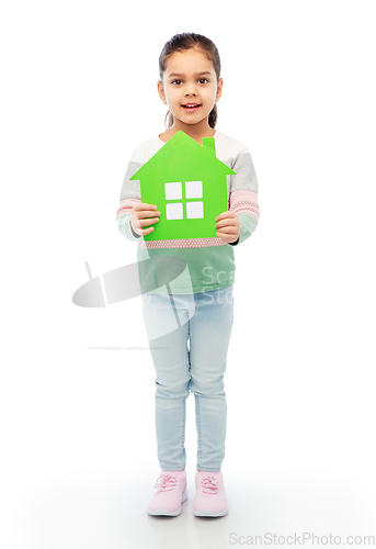 Image of smiling little girl holding green house icon