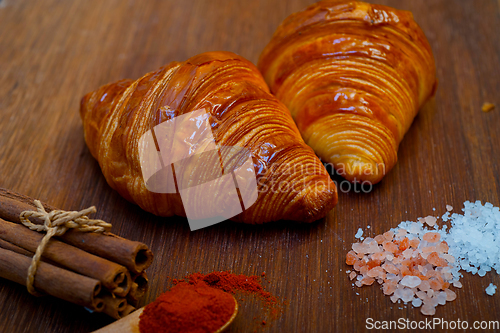 Image of french traditiona croissant brioche butter bread  on wood