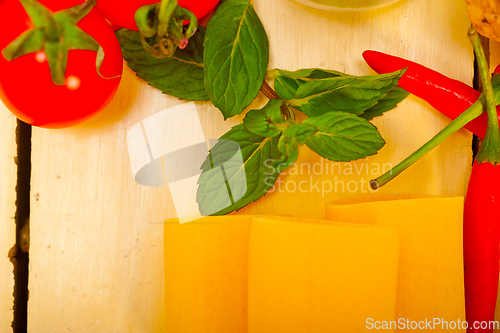 Image of Italian pasta paccheri with tomato mint and chili pepper