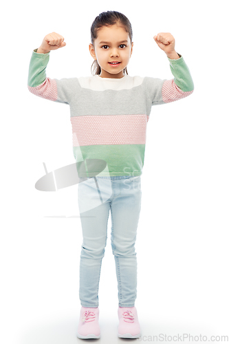 Image of happy girl showing fists over white background