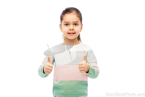Image of happy smiling girl showing thumbs up