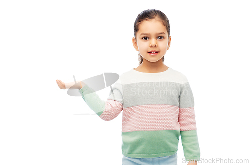 Image of happy smiling girl holding something imaginary