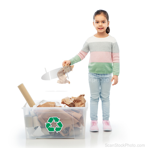 Image of smiling girl sorting paper waste