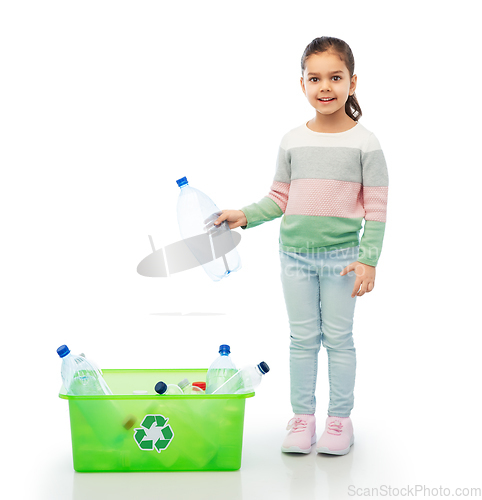 Image of smiling girl sorting plastic waste