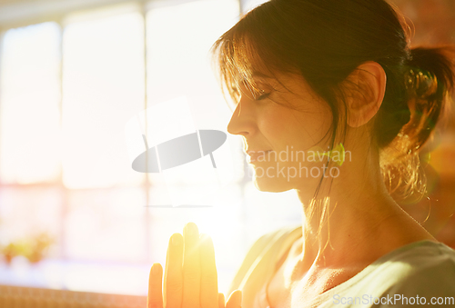 Image of close up of yogi woman meditating at yoga studio