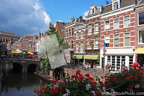 Image of Amsterdam downtown, Traditional old houses and a canals. Holland