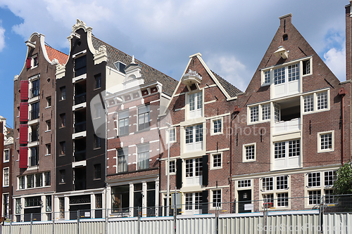 Image of Amsterdam downtown, Traditional old houses and a canals. Holland